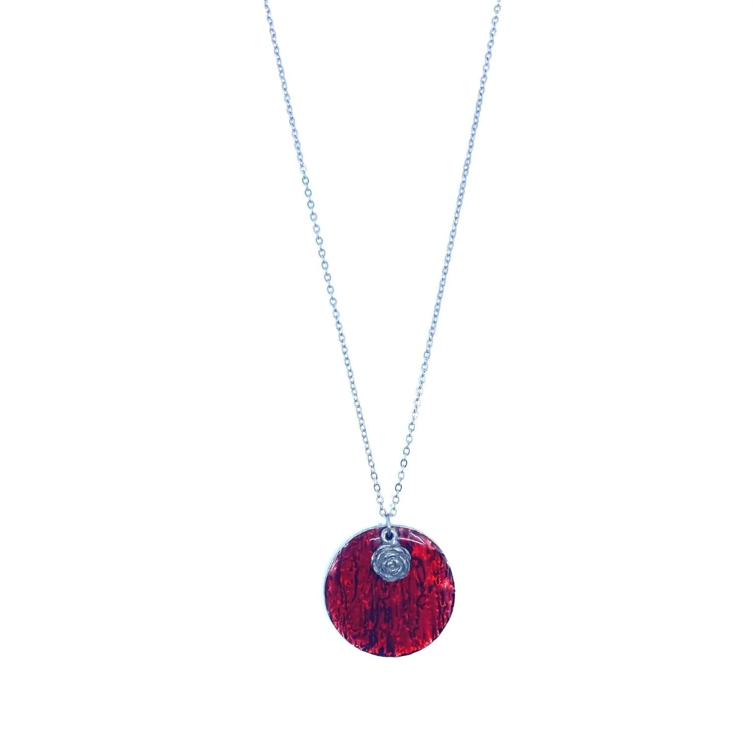 Pendentif rond rouge avec rose .jpg