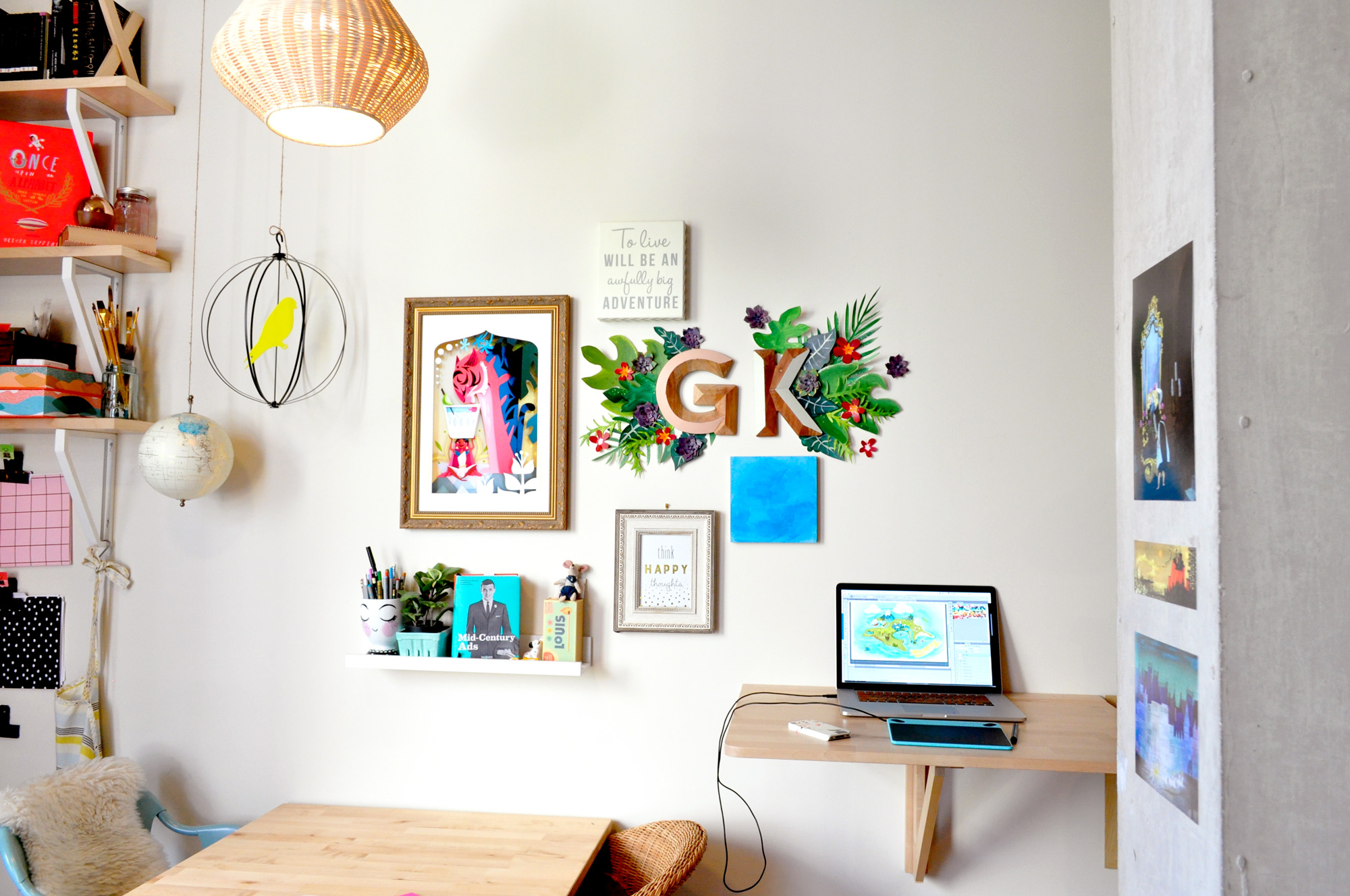 This is... pretty much my whole studio, plus the shelves on the left. Don't you love that natural light? We're so blessed to have two big windows on the other side of the room!