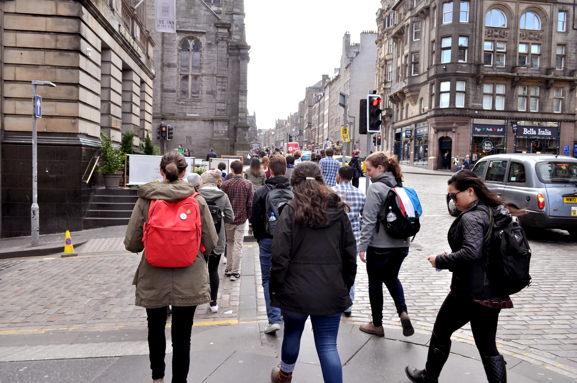 Walking tours. That red backpack helped Ethan keep track of me while he paused frequently to take pictures.