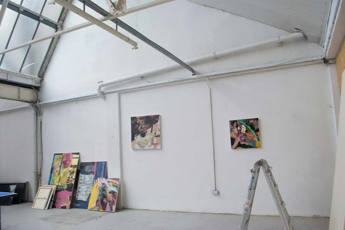 Paintings being photographed in studio