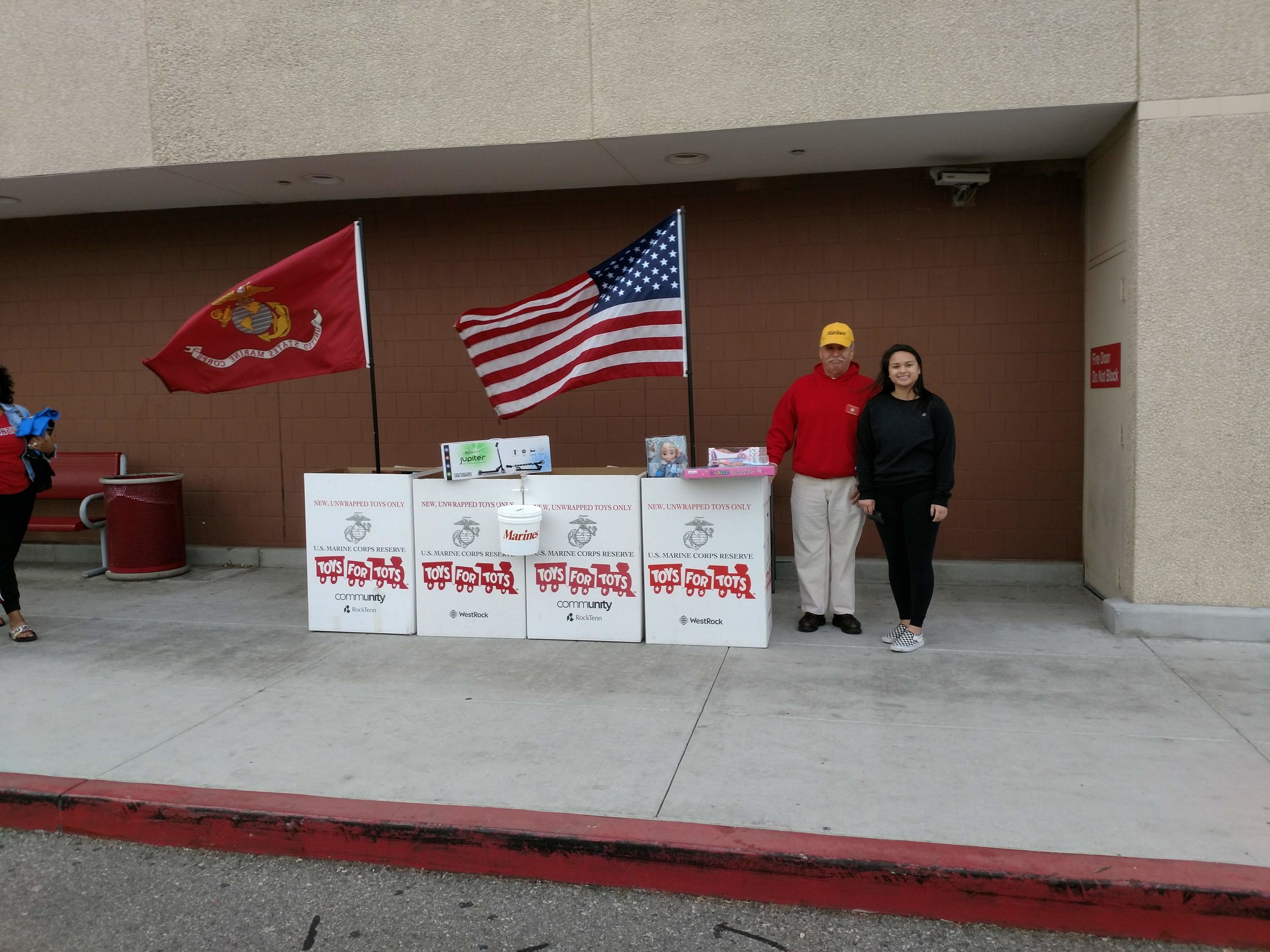 December 17, 2018 Bob Martinez has set up the Toys for Tots collection boxes in front of our new sight at the Target Store, Sycamore Square Mall on Cochran Street. Here he is with a young girl who passed by, said "I'll be back" and then returned a few minutes later with a number of toys for the program.
