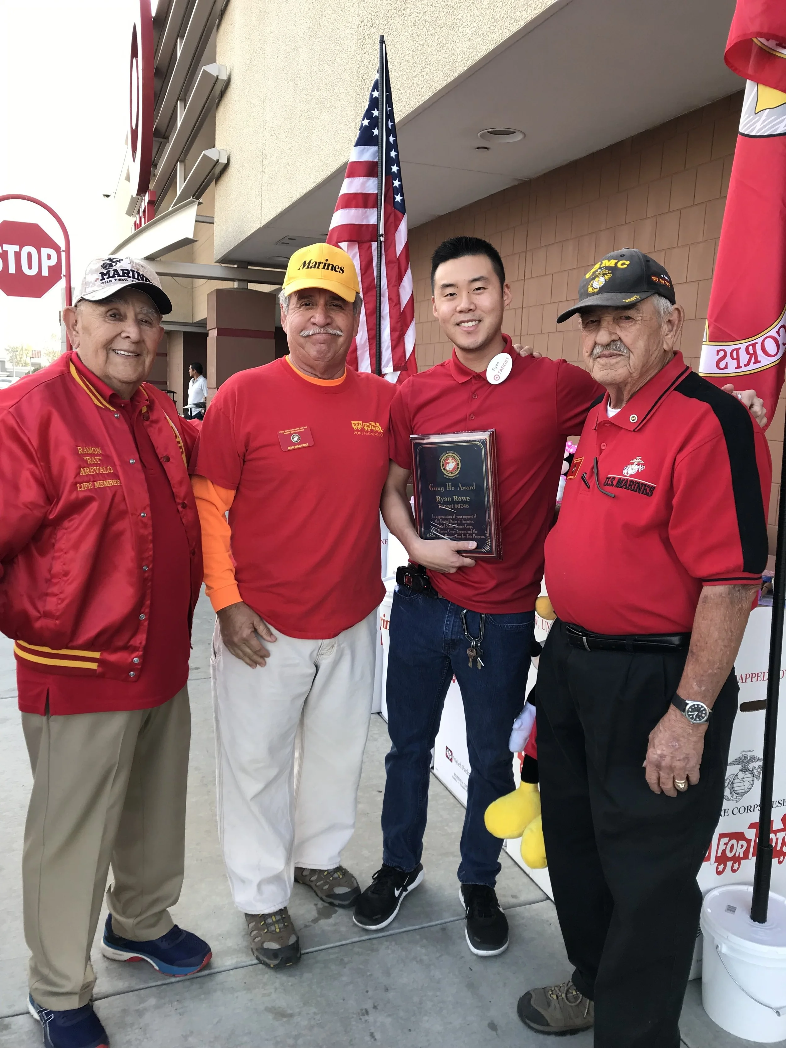 December 24, 2018 Members of Detachment 597 presenting a "Plaque of Appreciation" to Target Store Manager Ryan Rowe for everything he has done for the Toys for Tots Campaign this year. R/L: John Mitchell (Director of local Toys for Tots), Ryan Rowe (Mgr of Target Store, Sycamore Square), Bob Martinez (Ass't Director of Detachment Toys for Tots), and Ramon Arevalo (Detachment member).