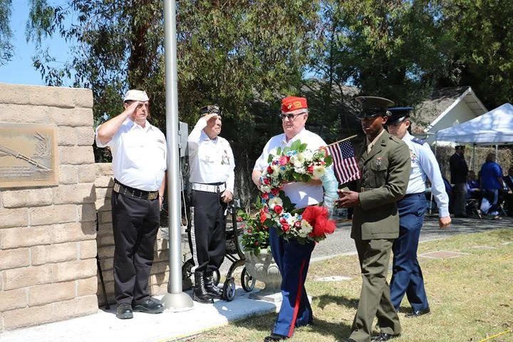 May 26, 2018 Commandant Jennings and "Brand New" Marine Pvt. Demetrius Narsten of Simi Valley place wreath at the 2018 Simi Valley Memorial Day Commemoration Ceremony at Pioneer Cemetery in Simi Valley.