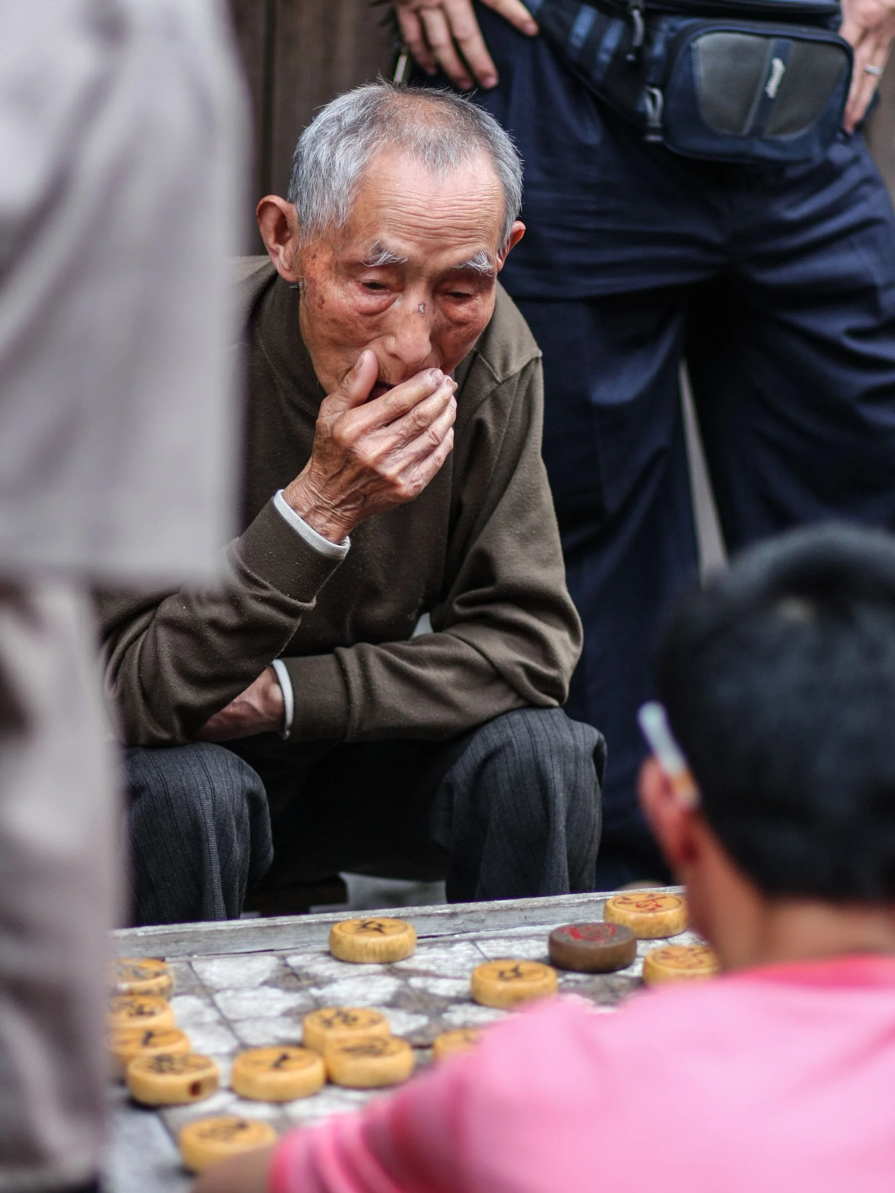 China old man playing chess.jpg