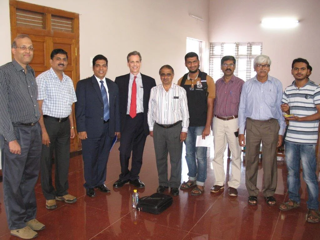 David Wiebers, M.D., with Professors at Mangalore University.