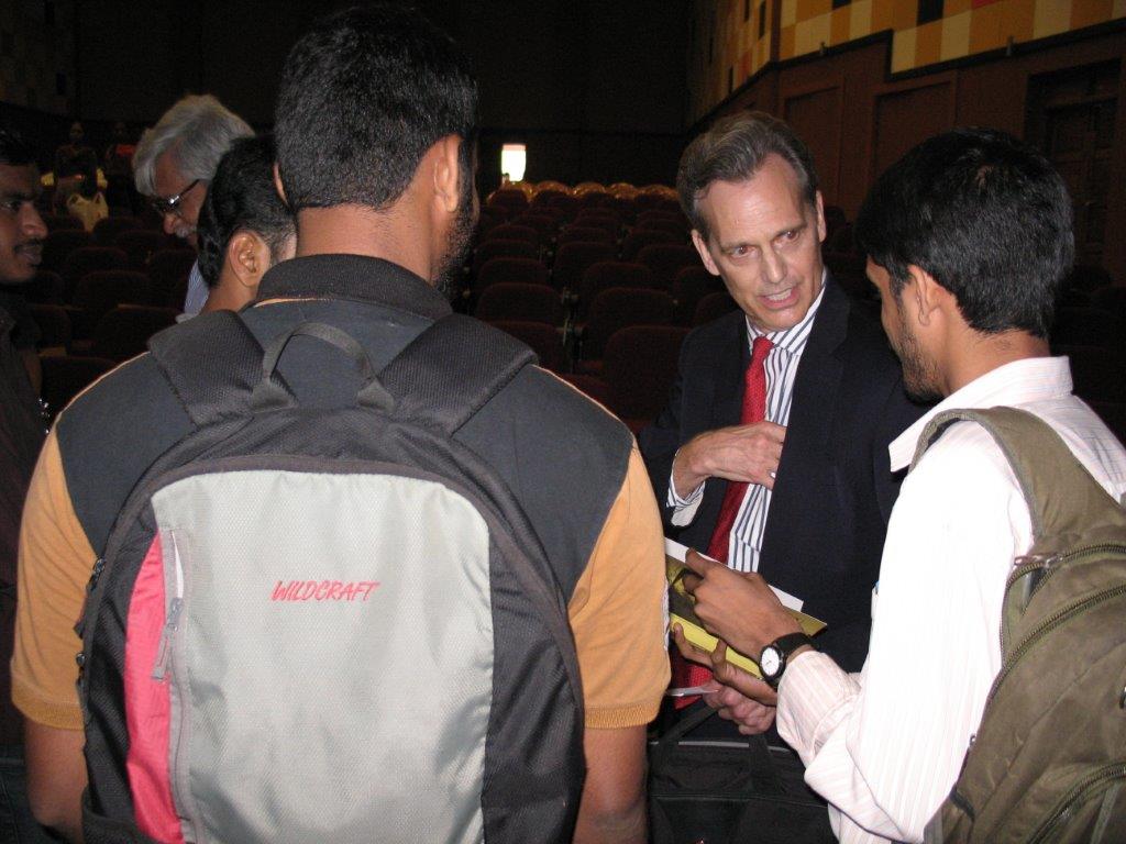 David Wiebers, M.D., and students during Q&A session after the Theory of Reality presentation at Mangalore University.