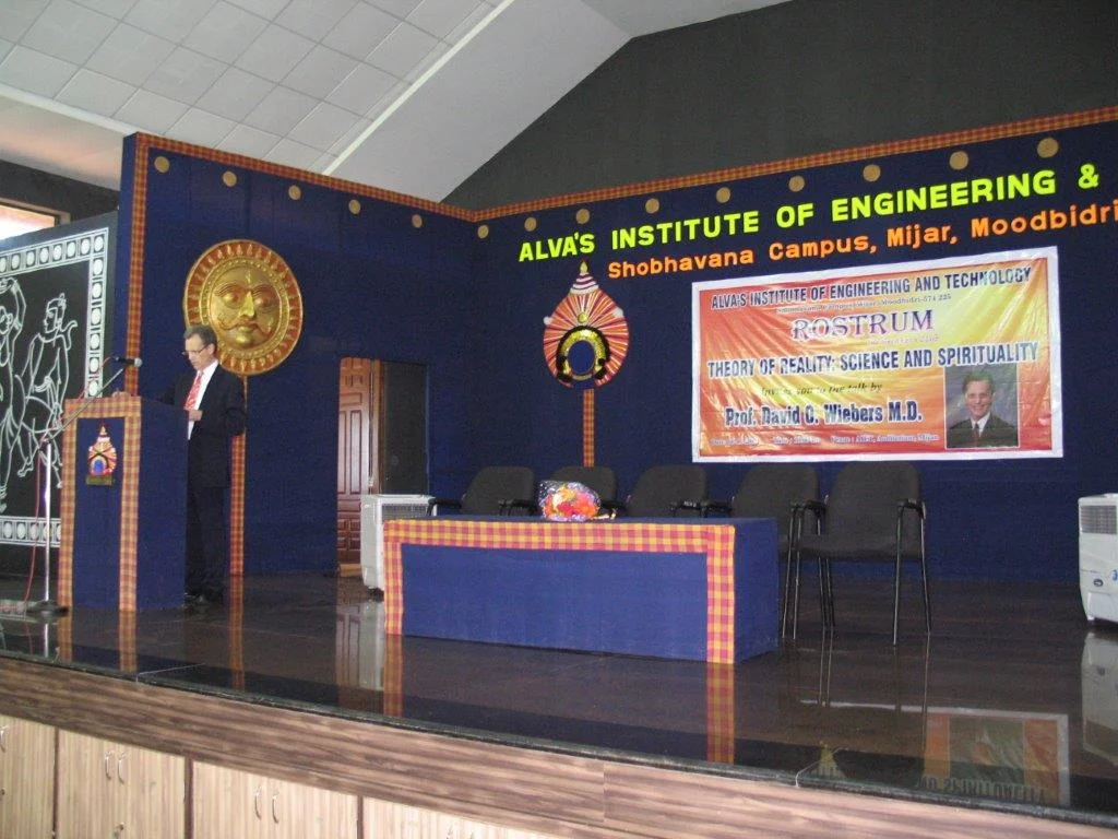 David Wiebers, M.D., at the podium at Alva's Institute of Engineering & Technology outside of Mangalore, India.