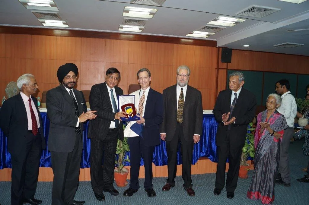 David Wiebers, M.D., awarded Honorary Professorship at Amity University by Amity Chancellor Dr. Ashok Chauhan on November 9, 2015.