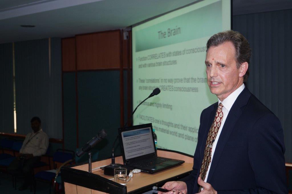 David Wiebers, M.D., delivering Theory of Reality presentation at Amity University Delhi campus on November 9, 2015.