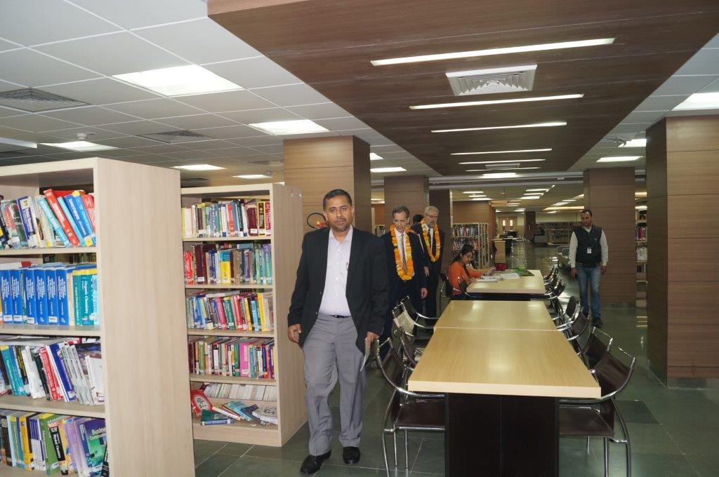 David Wiebers, M.D., touring Amity University Delhi campus library on November 9, 2015.