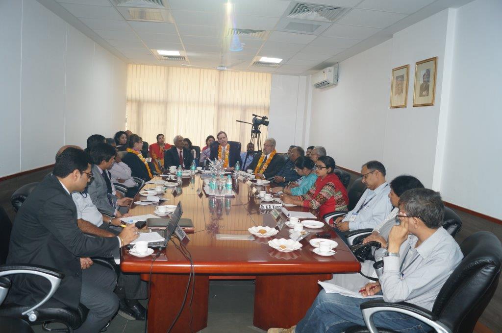 David Wiebers, M.D., and Amity University faculty in the President's conference room prior to touring Amity University Delhi campus on November 9, 2015. 