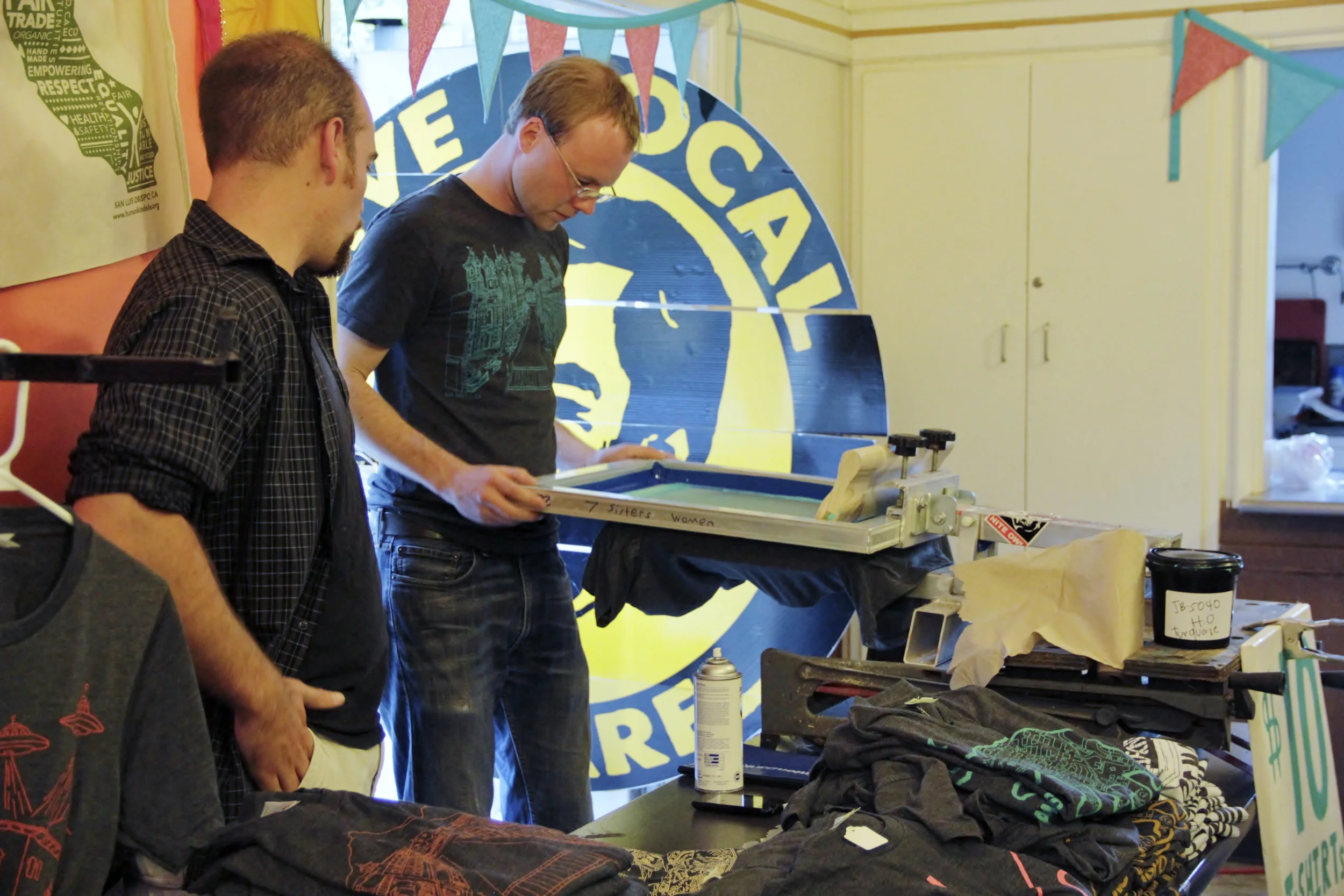 Screen Printed shirts right before your eyes at the event by Live Local Apparel