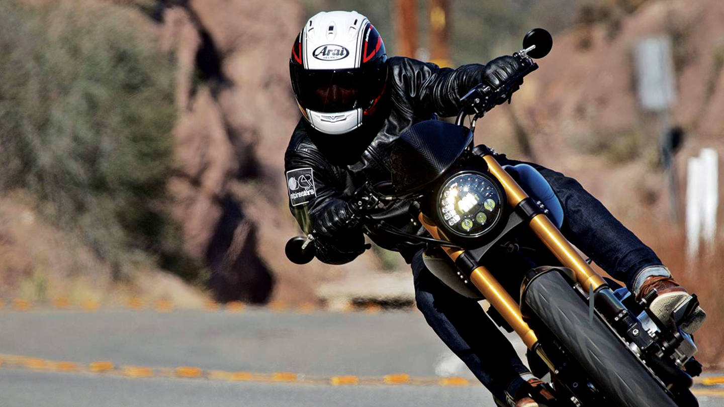 The extra travel in the rear suspension allows for heavy cornering unlike other cruisers. the look is not far from a cafe rider.