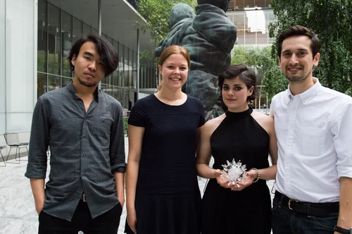 Winning FIT team with their prize, the glass microbe.