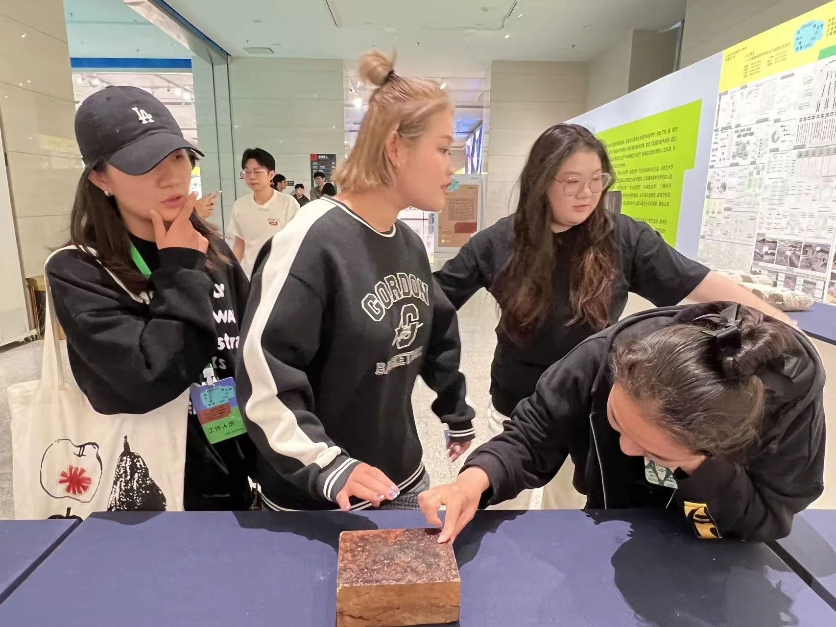 YAU Exhibition viewers touch Mycobrick.JPG