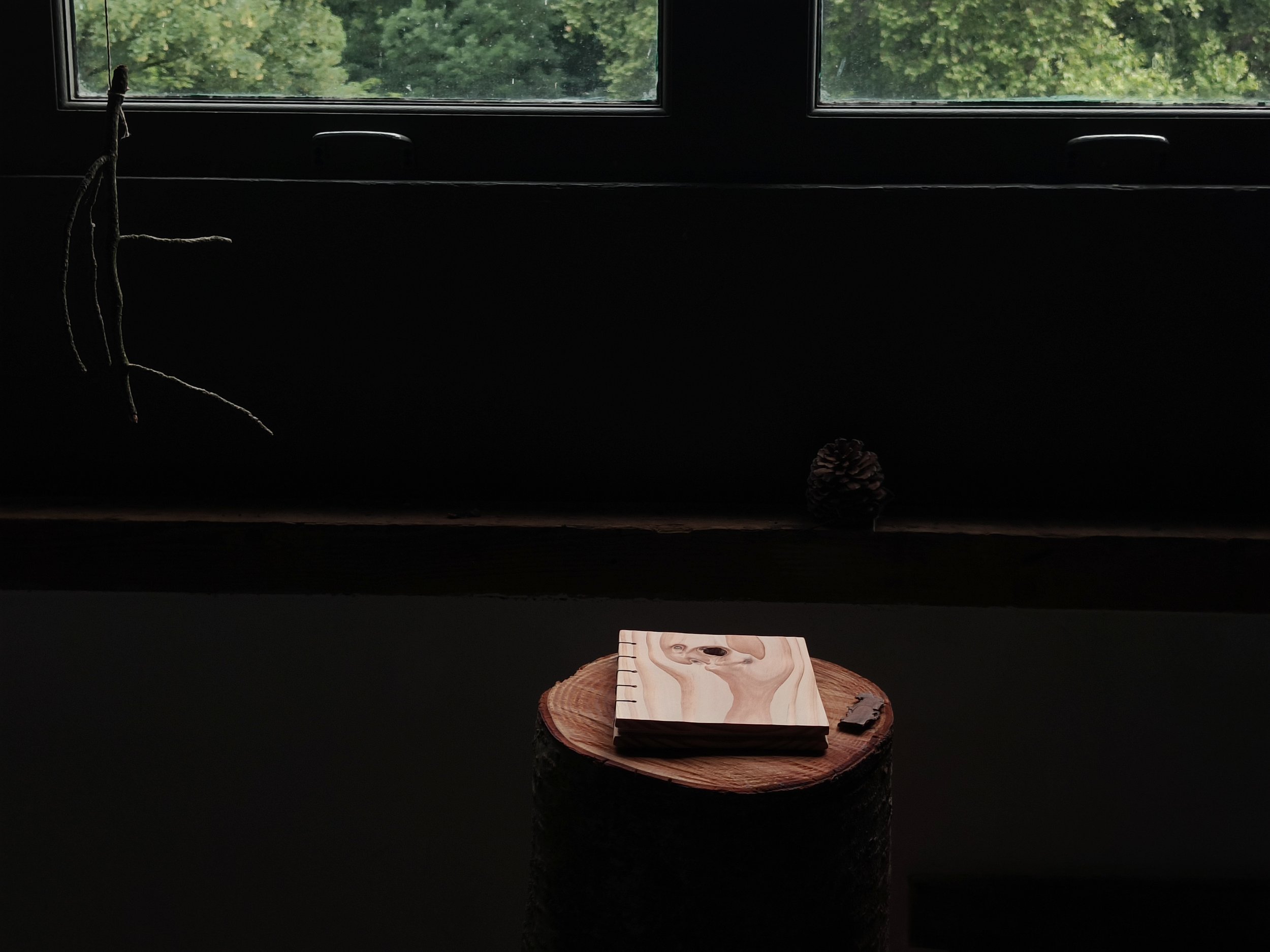  For this challenge, I also created my own poetry bundle—one where all the senses are triggered. I decided to use wood as a hard cover for my bundle, bringing feeling and smell into the reading experience. It also felt right to bring the paper I prin