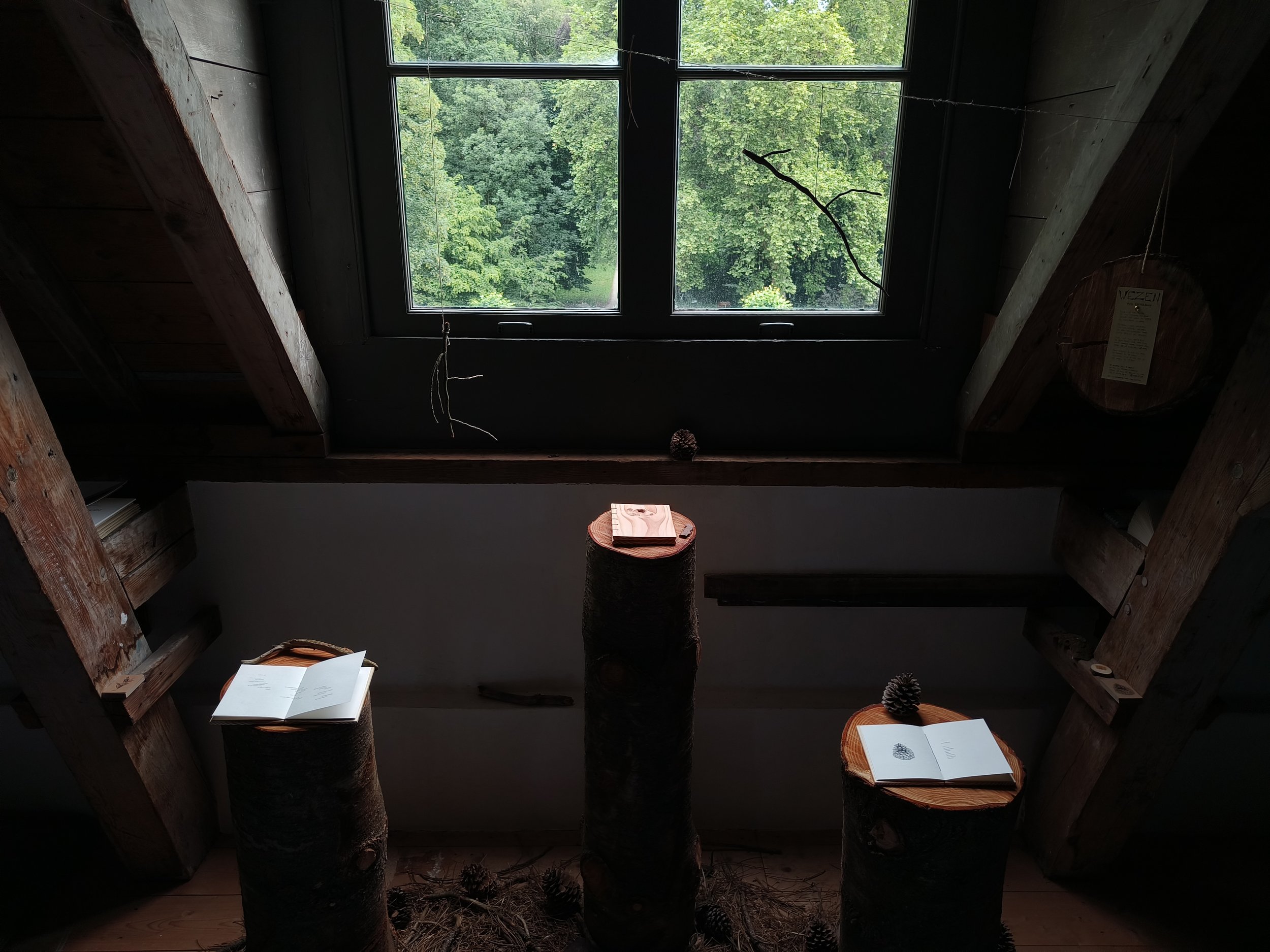  For this challenge, I also created my own poetry bundle—one where all the senses are triggered. I decided to use wood as a hard cover for my bundle, bringing feeling and smell into the reading experience. It also felt right to bring the paper I prin