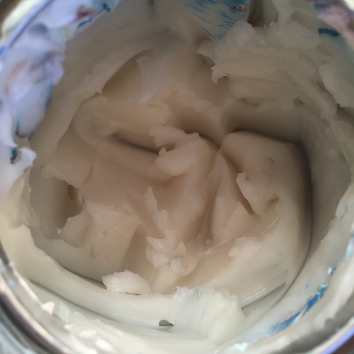 The interior of a can of cold wax. Spread thin it isn't white, rather, it is colorless. 
