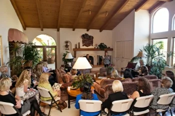 President Linda Reifschneider speaking to Las Damas de Fairbanks about AES