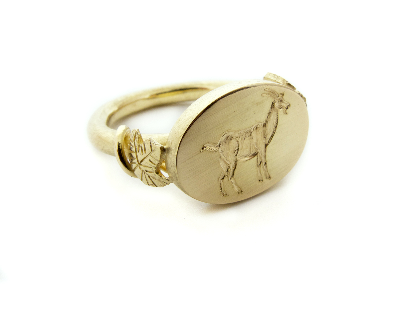signet seal ring with horned goat and grape leaves, 18ct yellow gold