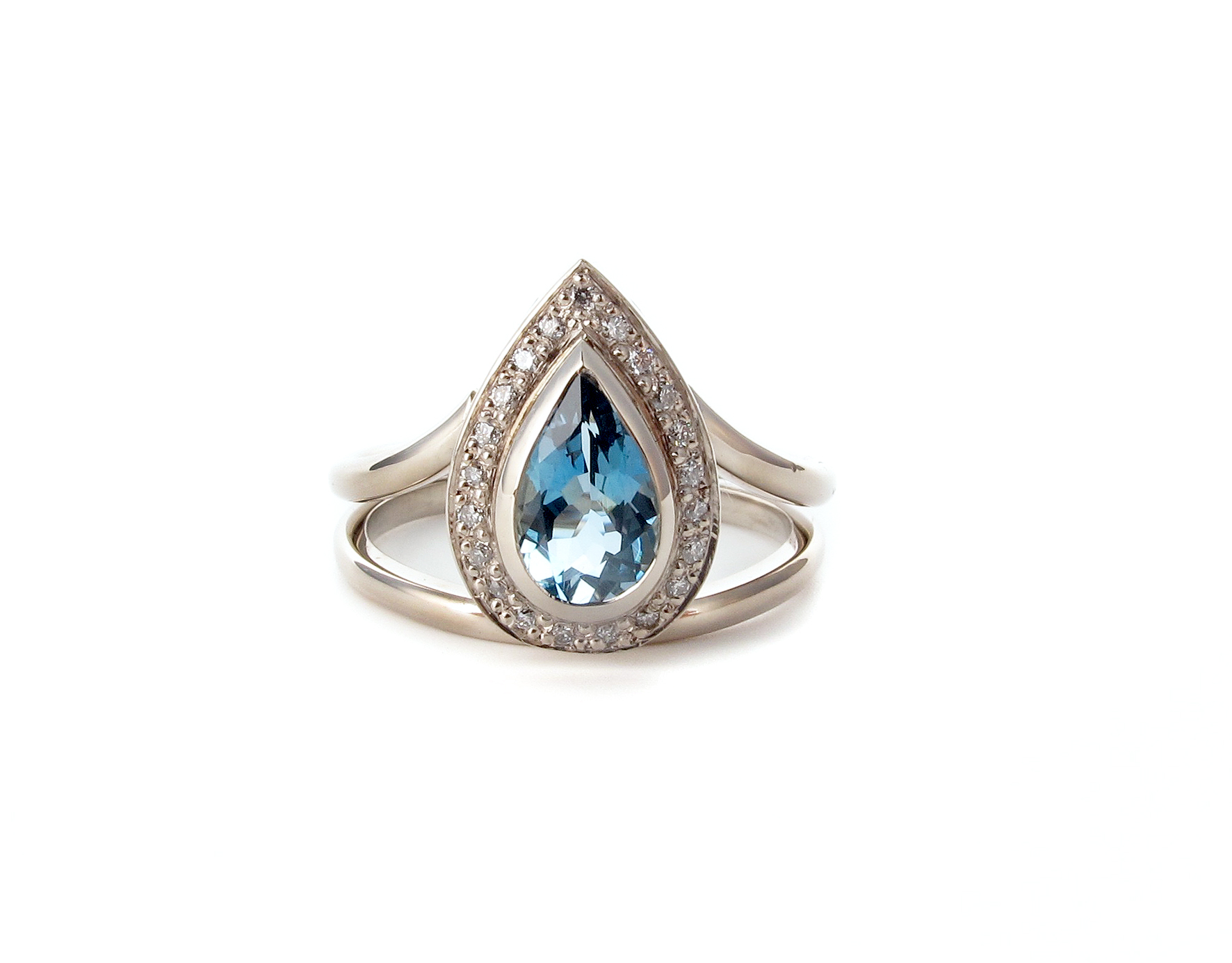 pear shaped aquamarine and diamond engagement ring in 9ct white gold