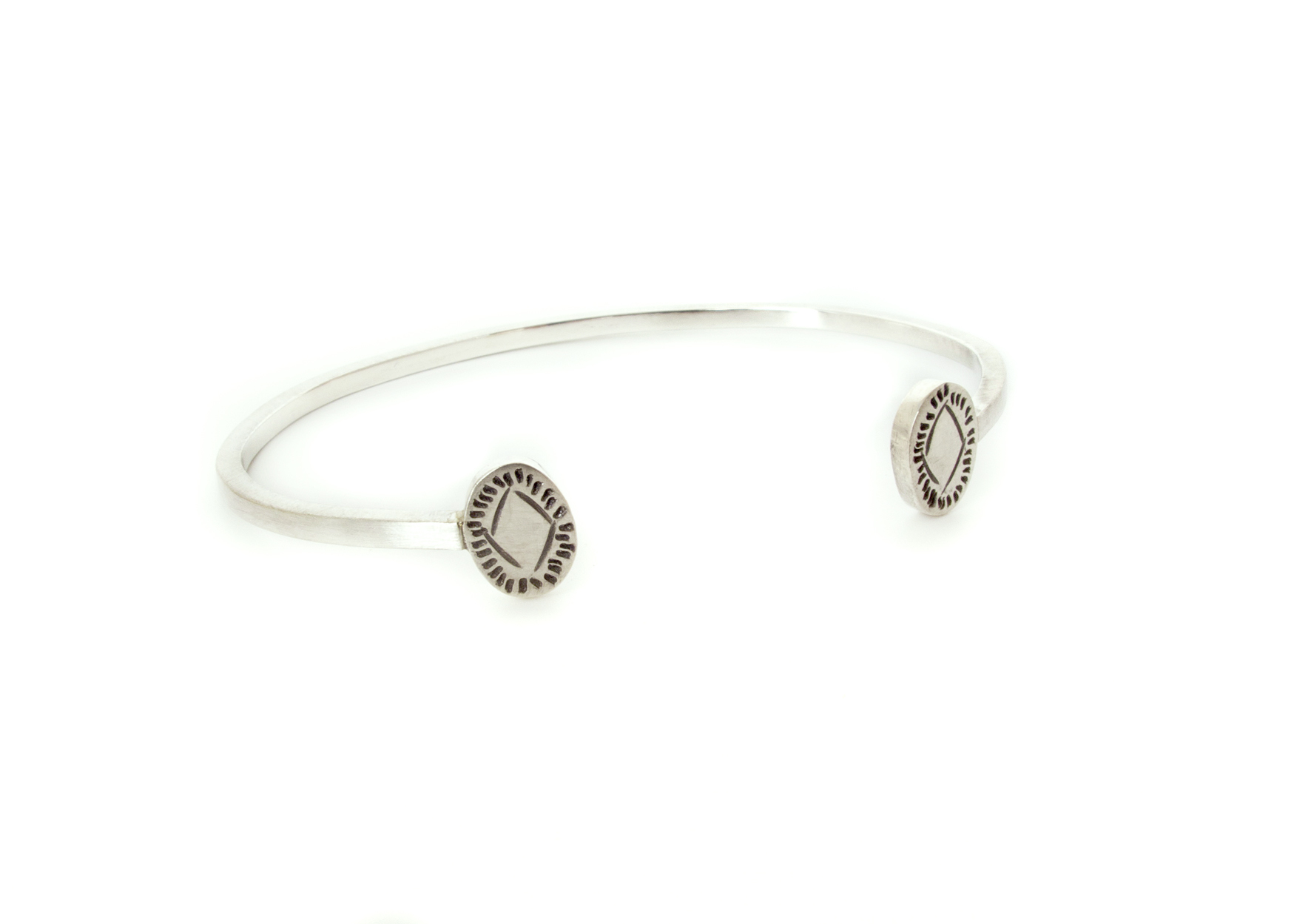 hand stamped wrist cuff in solid sterling silver