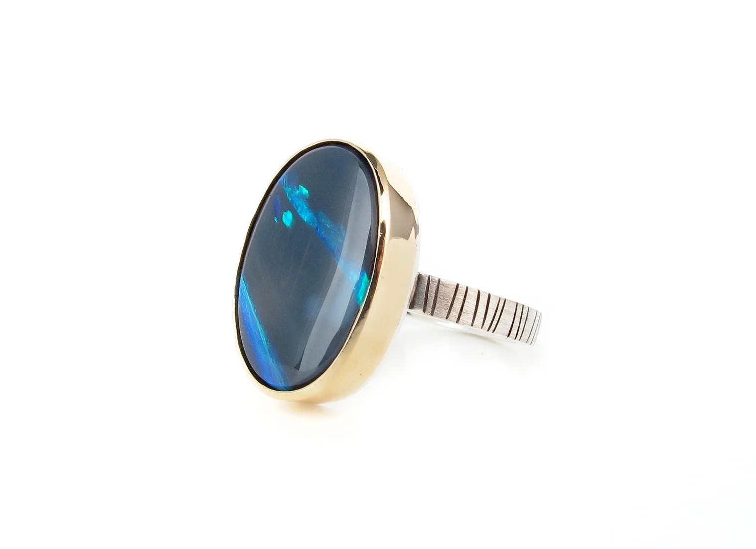 lighting ridge opal in 9ct yellow gold & sterling silver