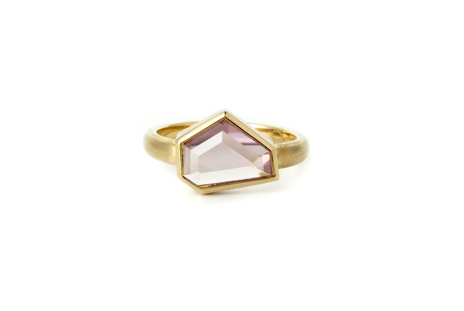 Australian purple zircon freeform ring in 18ct yellow gold