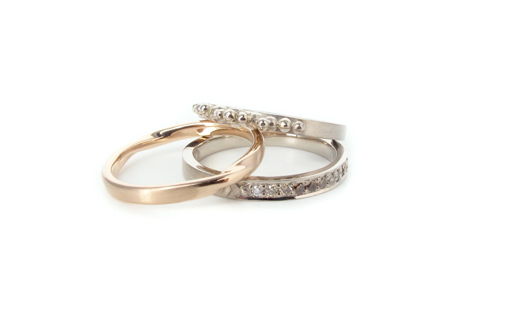 rose gold soft twist band, white gold granule ring & ombre argyle diamond band
