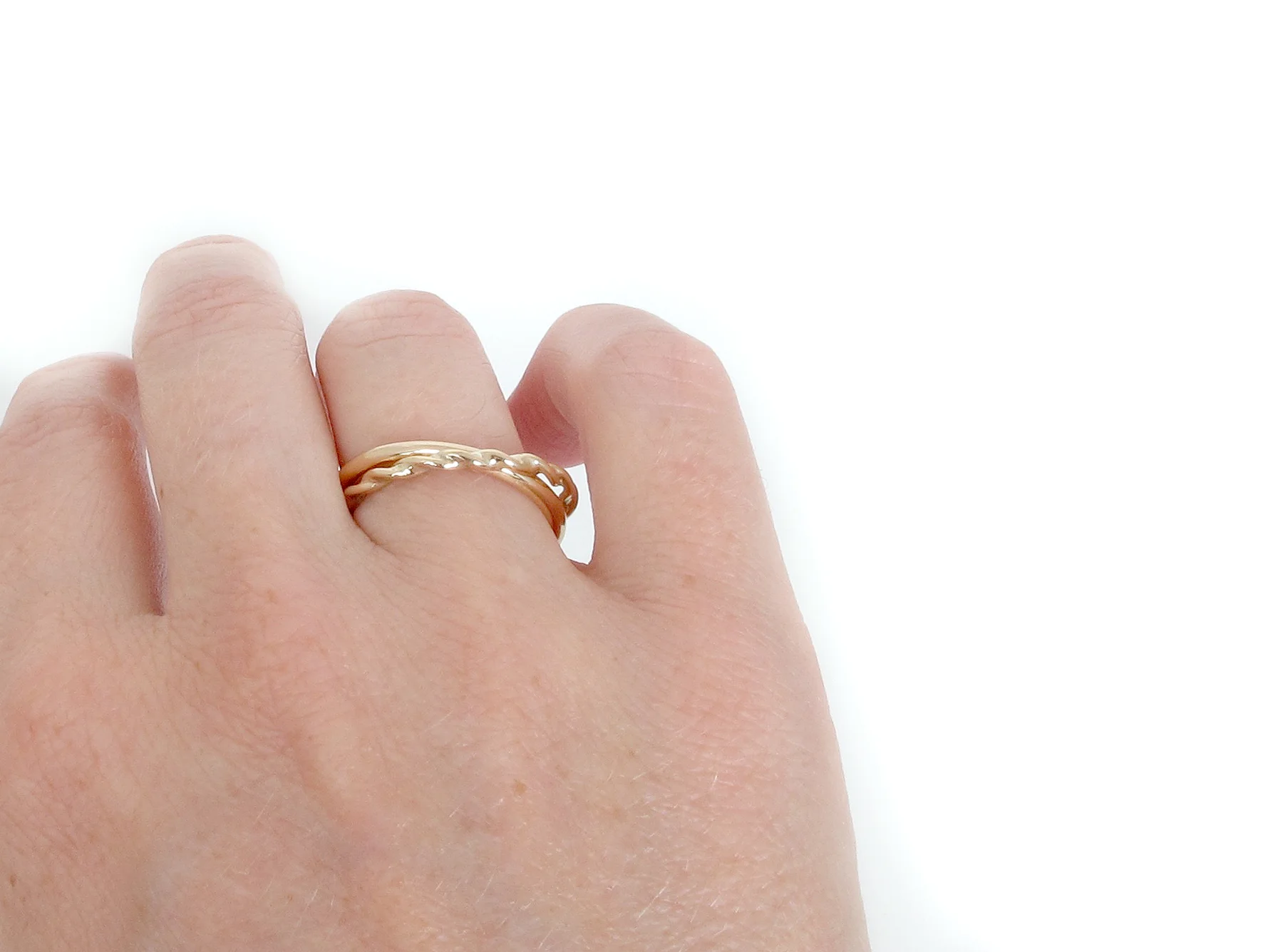gold rope ring on hand.jpg