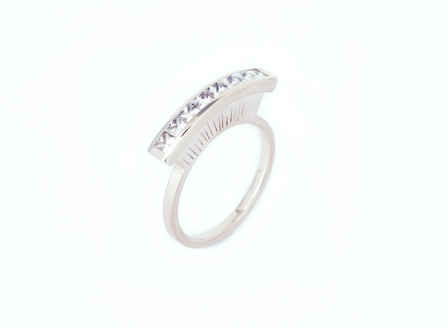 Alto ring with channel set princess cut diamonds in 18ct white gold