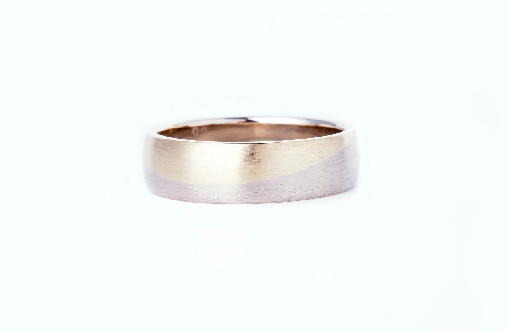 wedding band made using customers recycled heirloom 9ct yellow gold, and new 9ct white gold