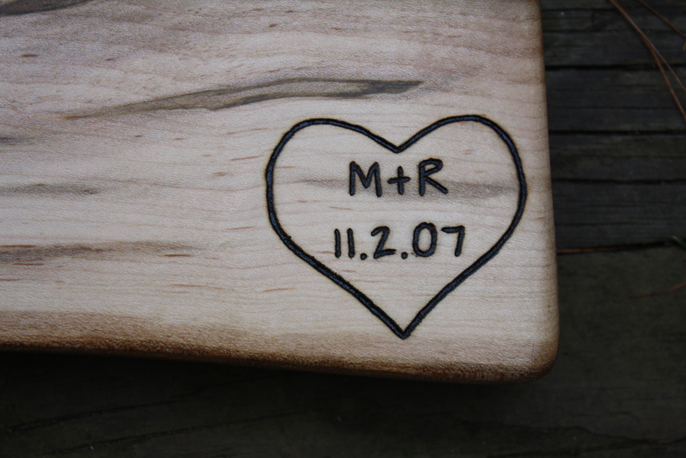 Heart engraving with initials and date 