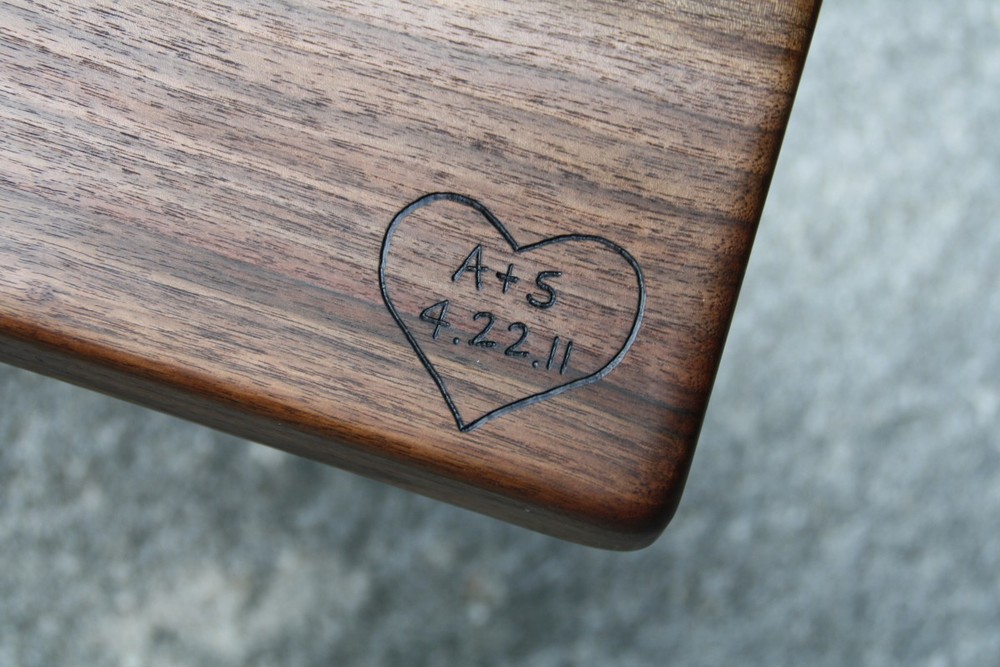 Heart engraving with initials and date on Black Walnut