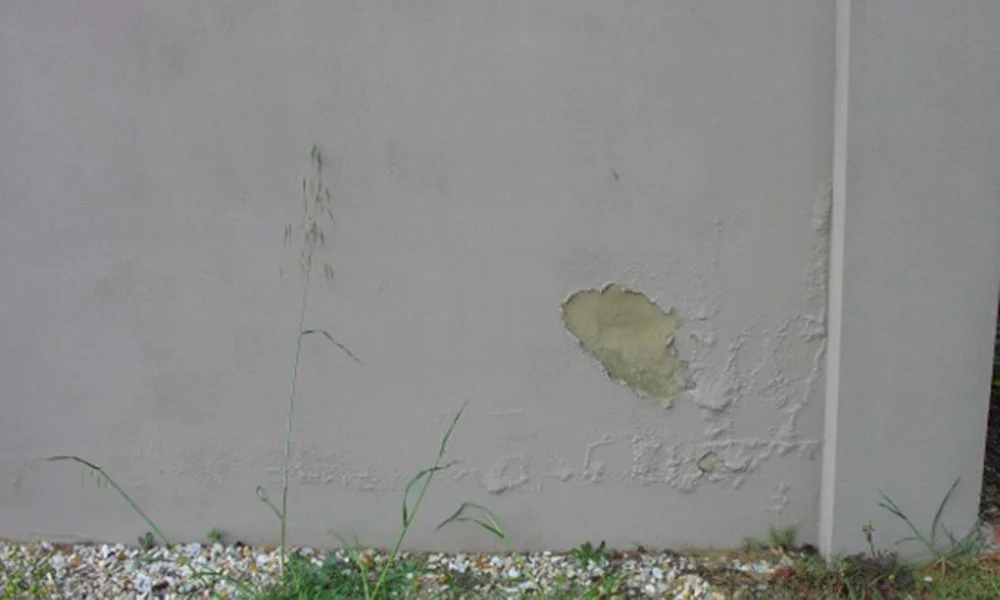 Repairs Right Coat Render bubbling.JPG