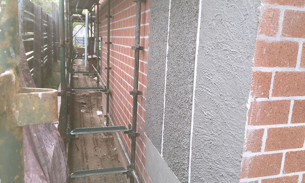 Brick Covered by Rough Cast Plastering by RightCoat Rendering Mornington.JPG