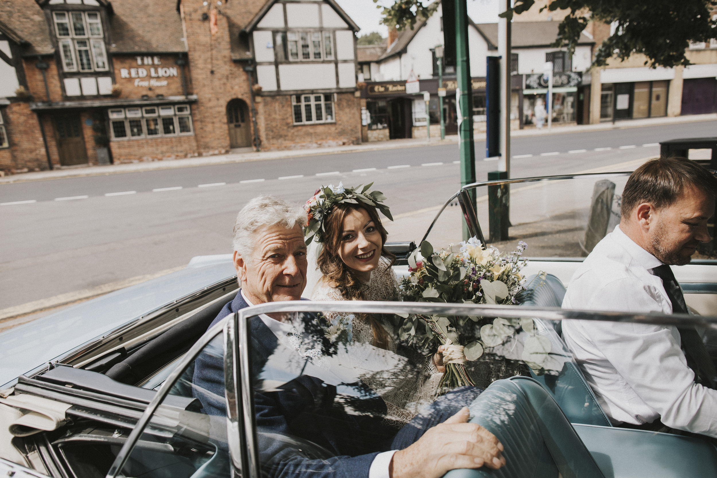 Bride arriving in wedding car