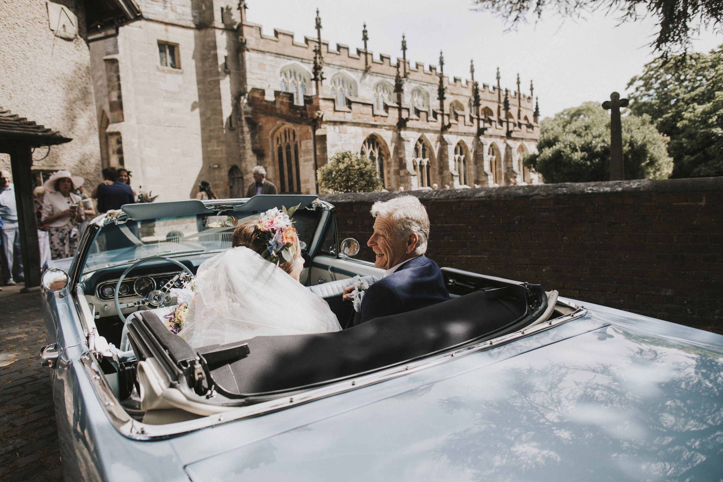 Bride arriving in wedding car