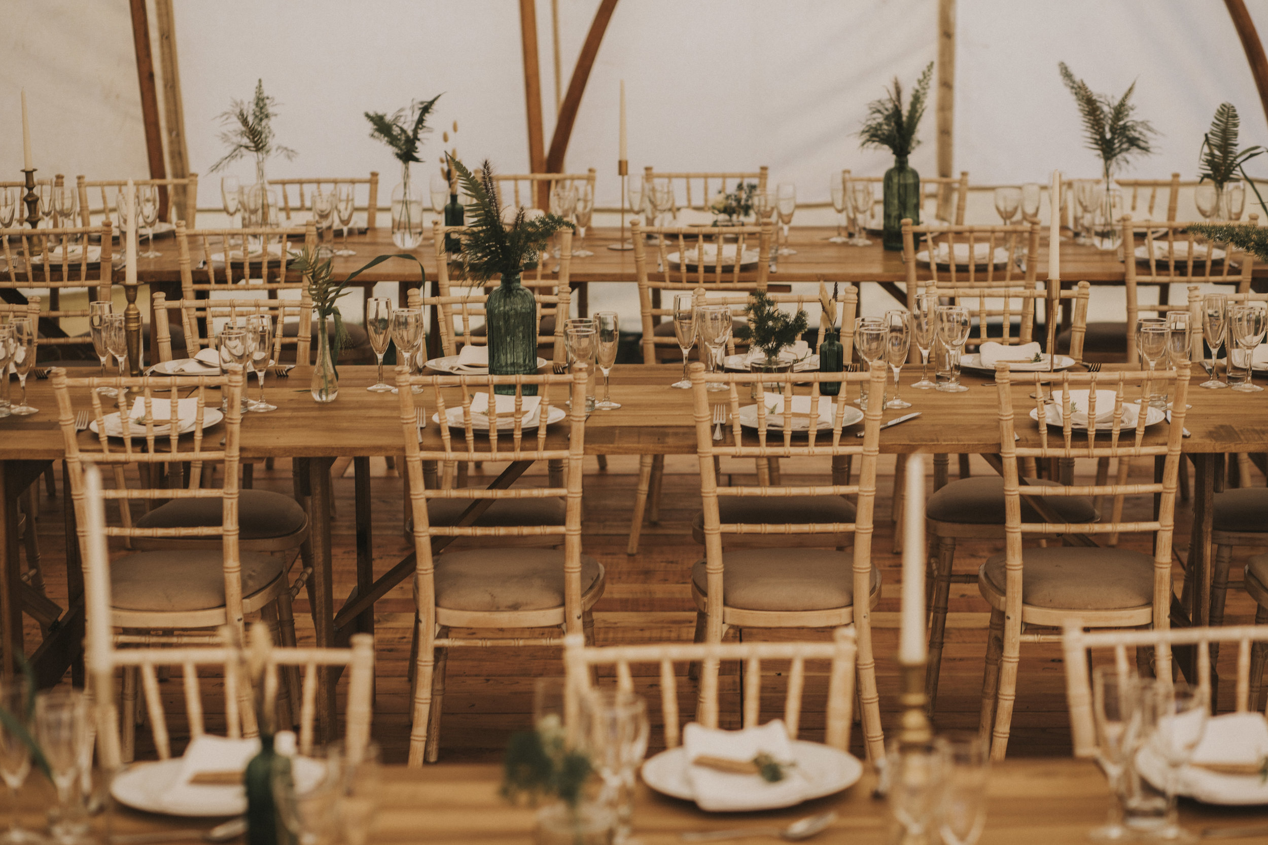  Table and chairs ins sperry tent, festival wedding 