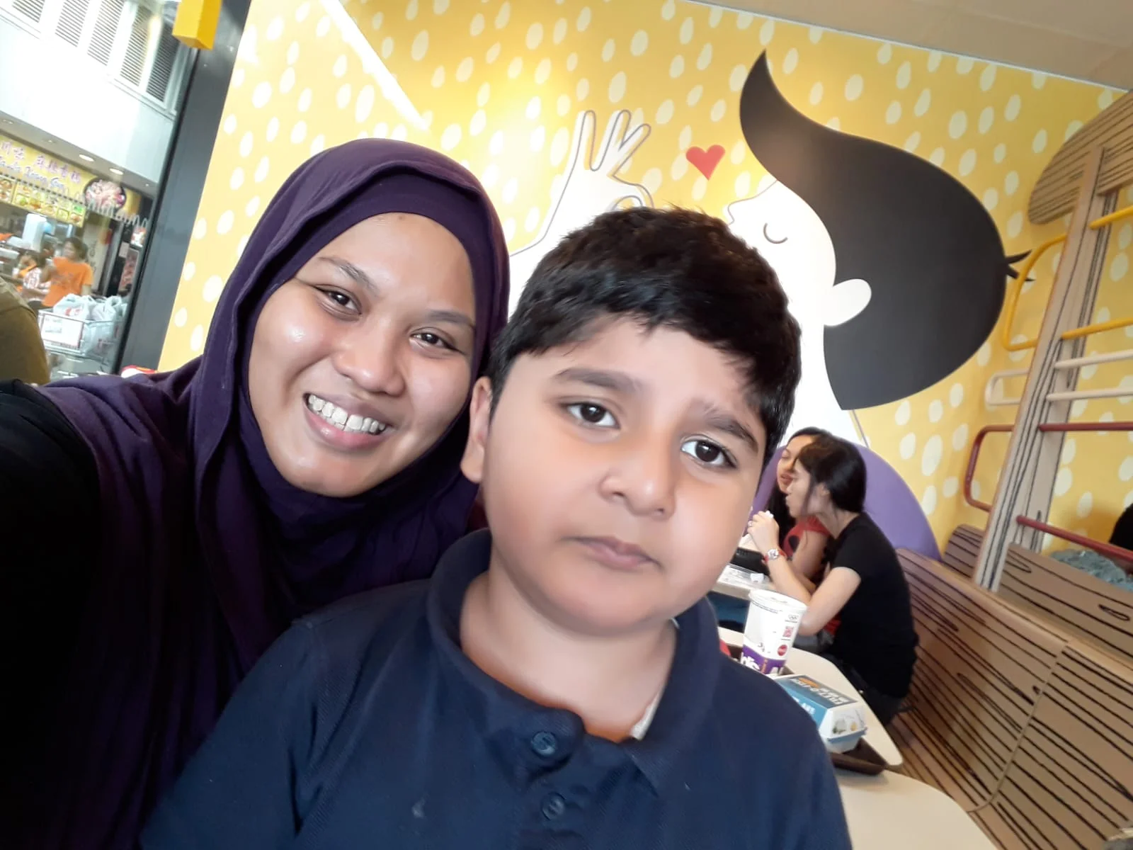 Nurul (seen left in picture)