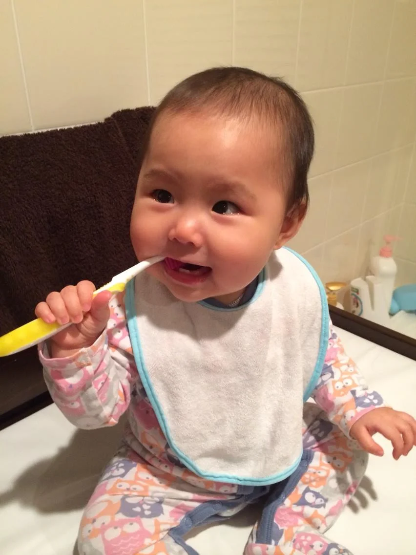 This was the first time she brushed her teeth!