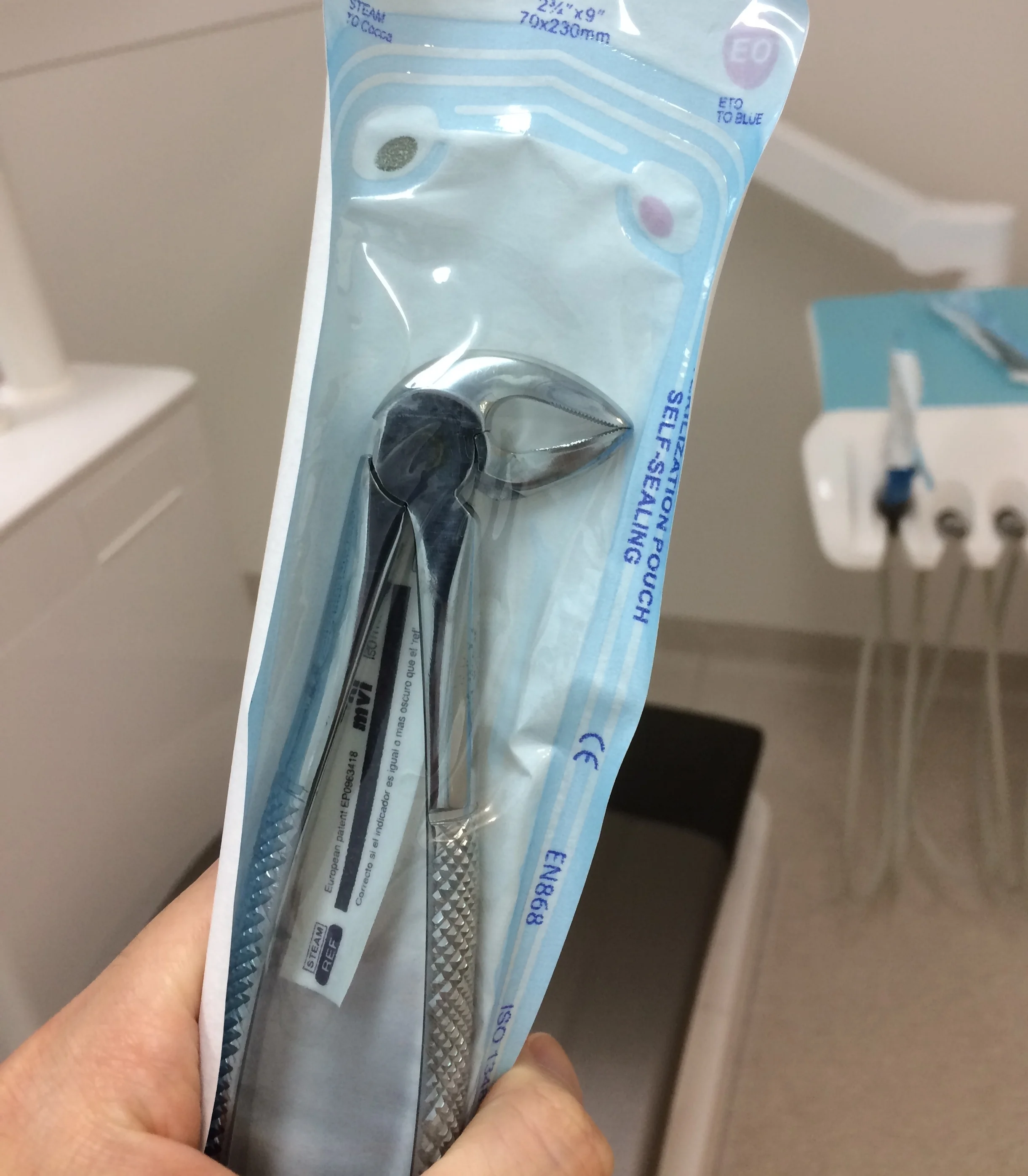 Dental extraction forcep in sterilised bad with indicator