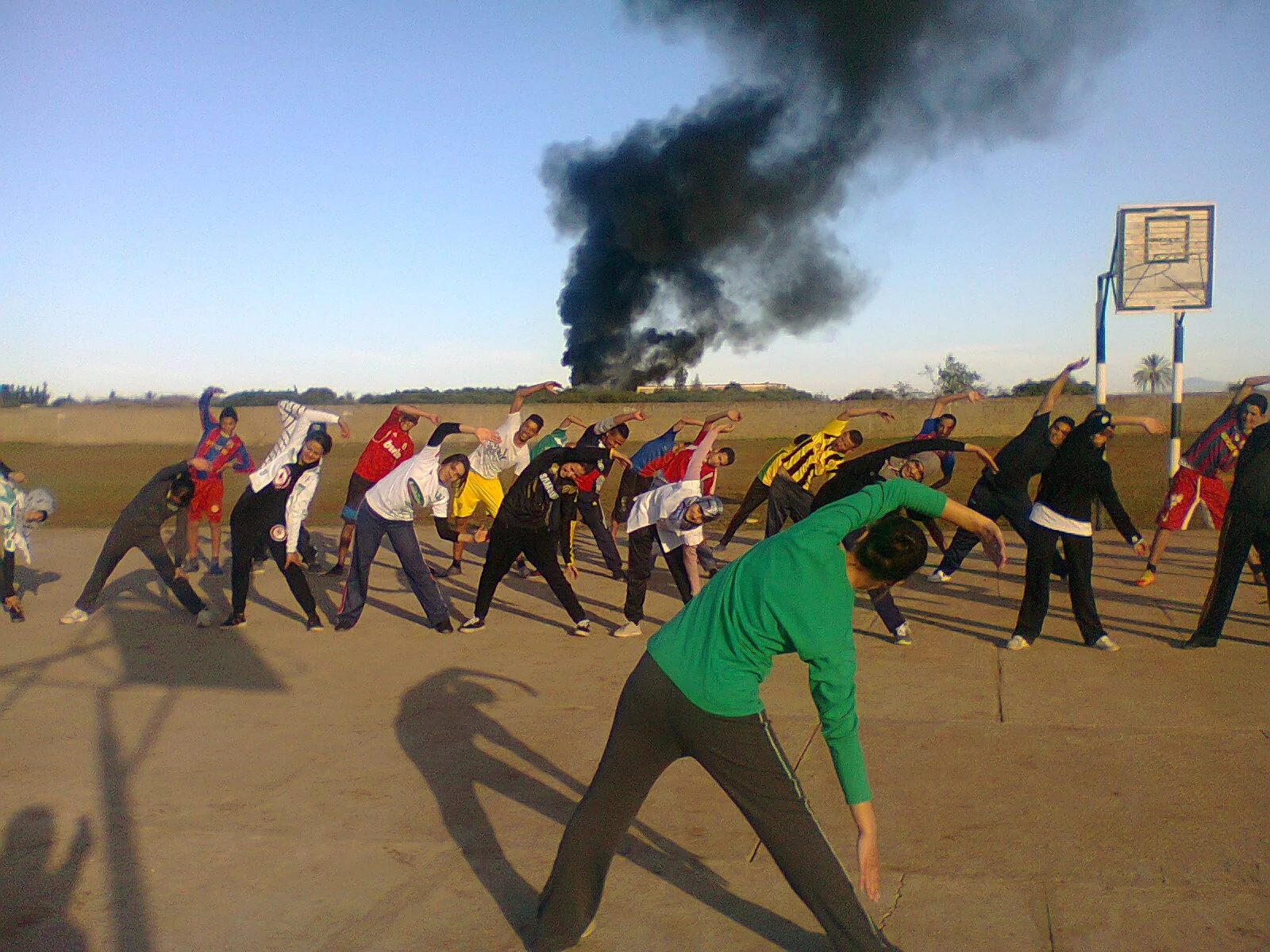 Location: In the school yard in 2014 Caption: The pollution specter lives with us, very close to us. Are we going to live or coexist with it