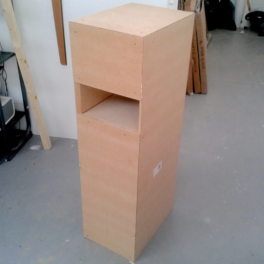 A shelved plinth mid construction