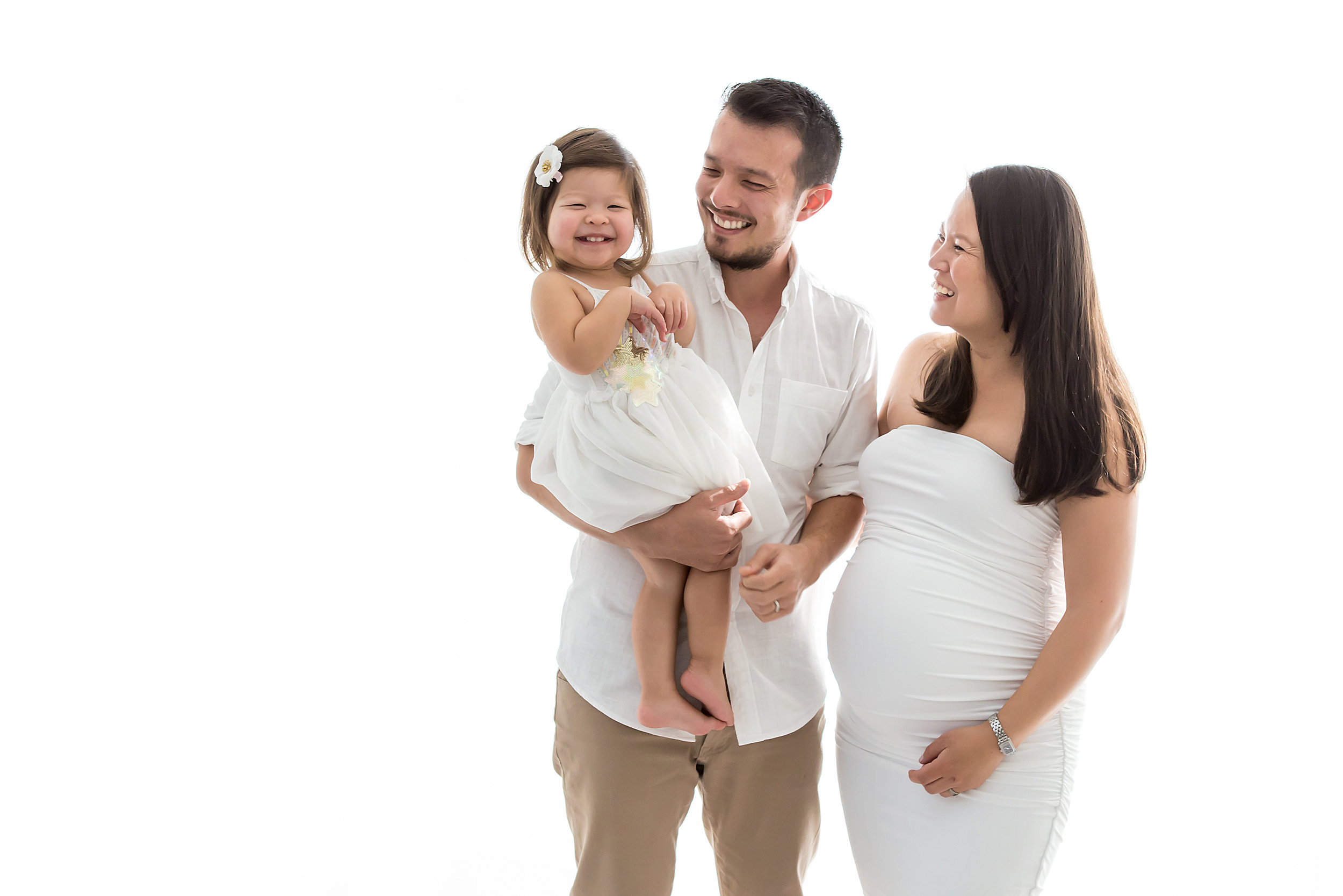 Family photograph taken in natural light studio in Melbourne by professional photographer