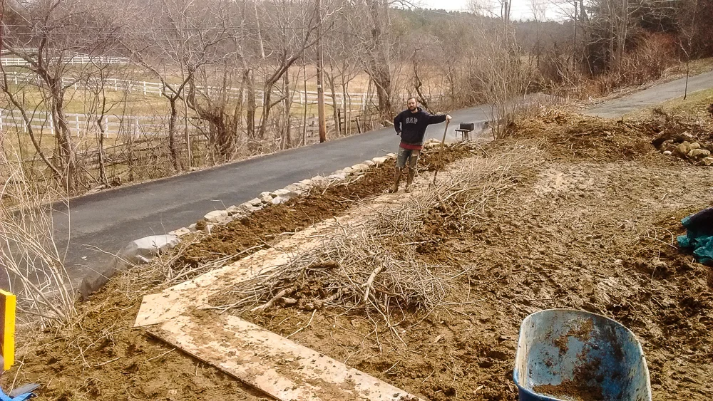 front two hugel beds, brush piles and compost / soil being added