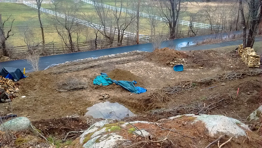 March 2016 Putting in the hugelkutlur beds on bottom 2 of 4 levels of terraces and along stone wall.