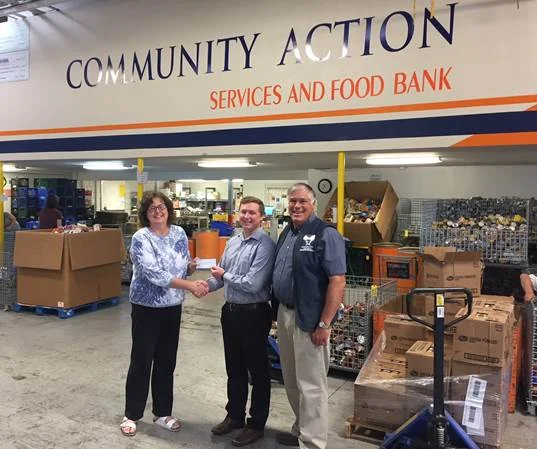 Pictured left to right: Karen, Community Action Services and Food Bank; David Hartshorn, Mariner Finance Branch Manager in Orem, UT; Dave, Community Action Services and Food Bank