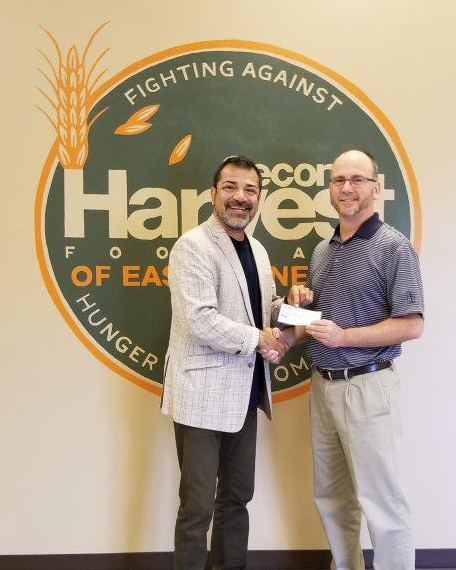 Pictured from left to right: Michael Torano - Director of Development at Second Harvest, Wes Killion - Branch Manager of Mariner Knoxville West location