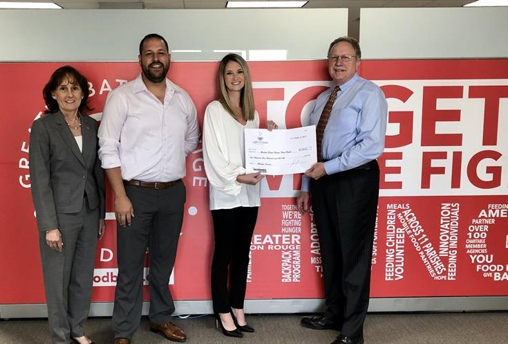Pictured: James Hartranft, AVP and Kellie Tunnard, BM (center)
